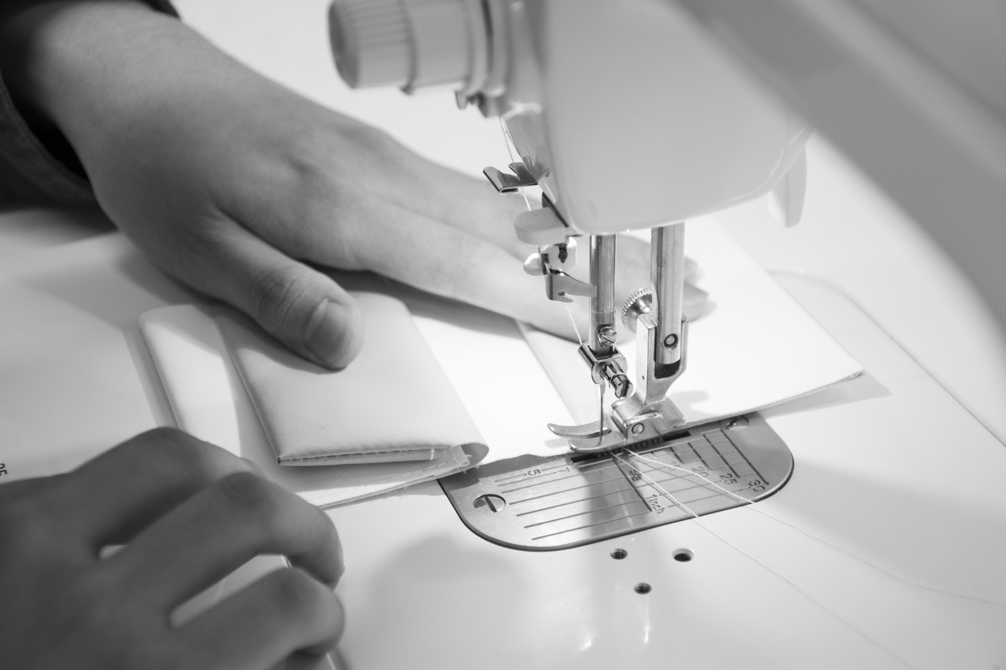 hands sewing detail